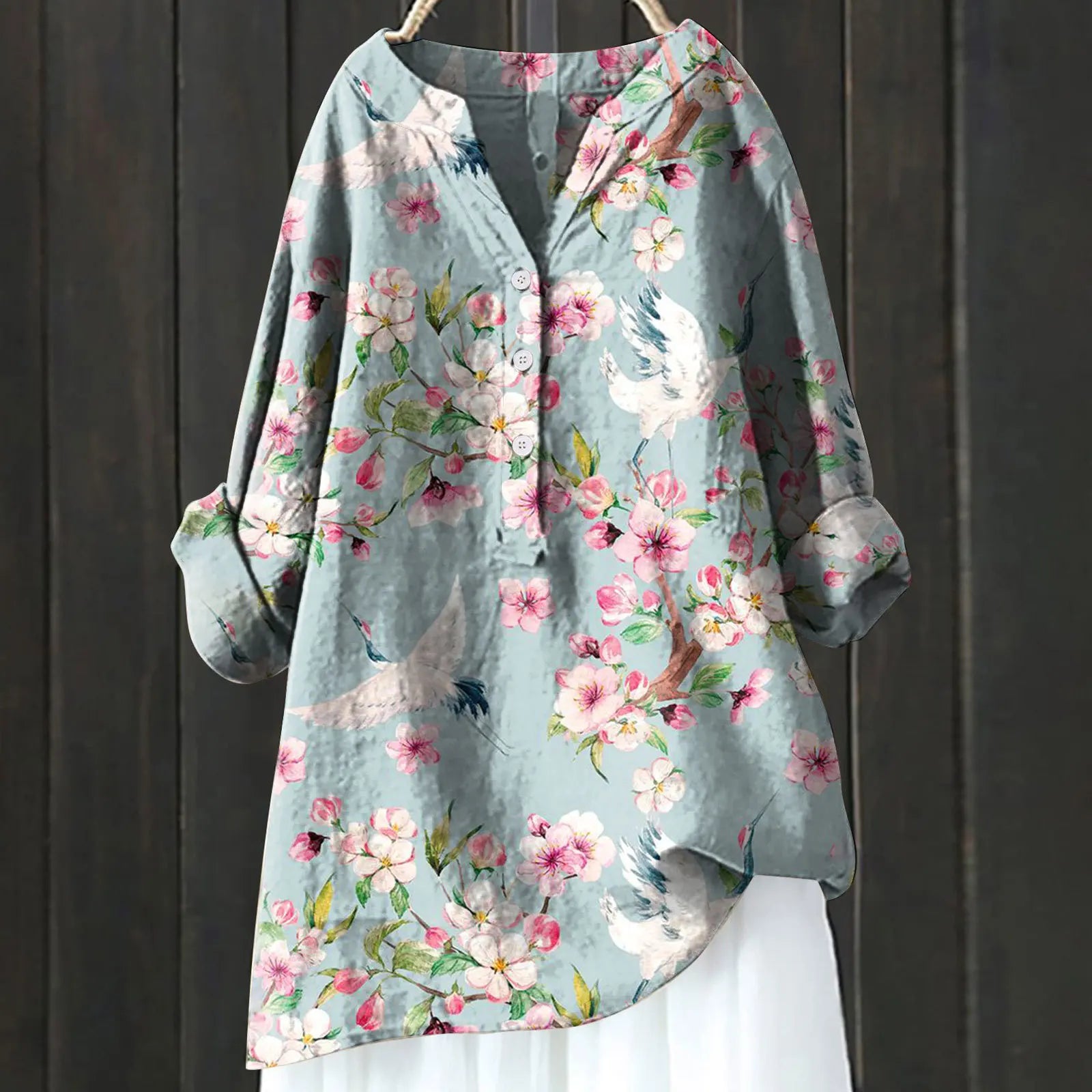 Poppy – Chic Blouse with Floral Accents