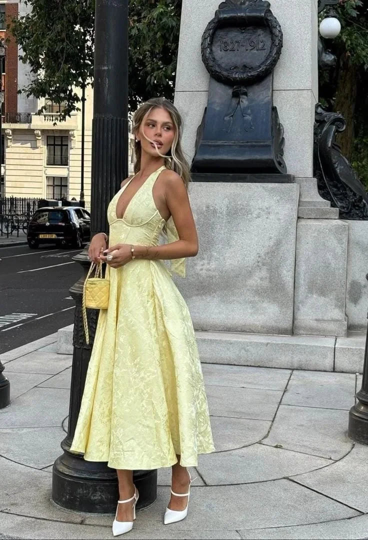 Eleanor - Women’s Yellow Halter Dress with Pleated Skirt
